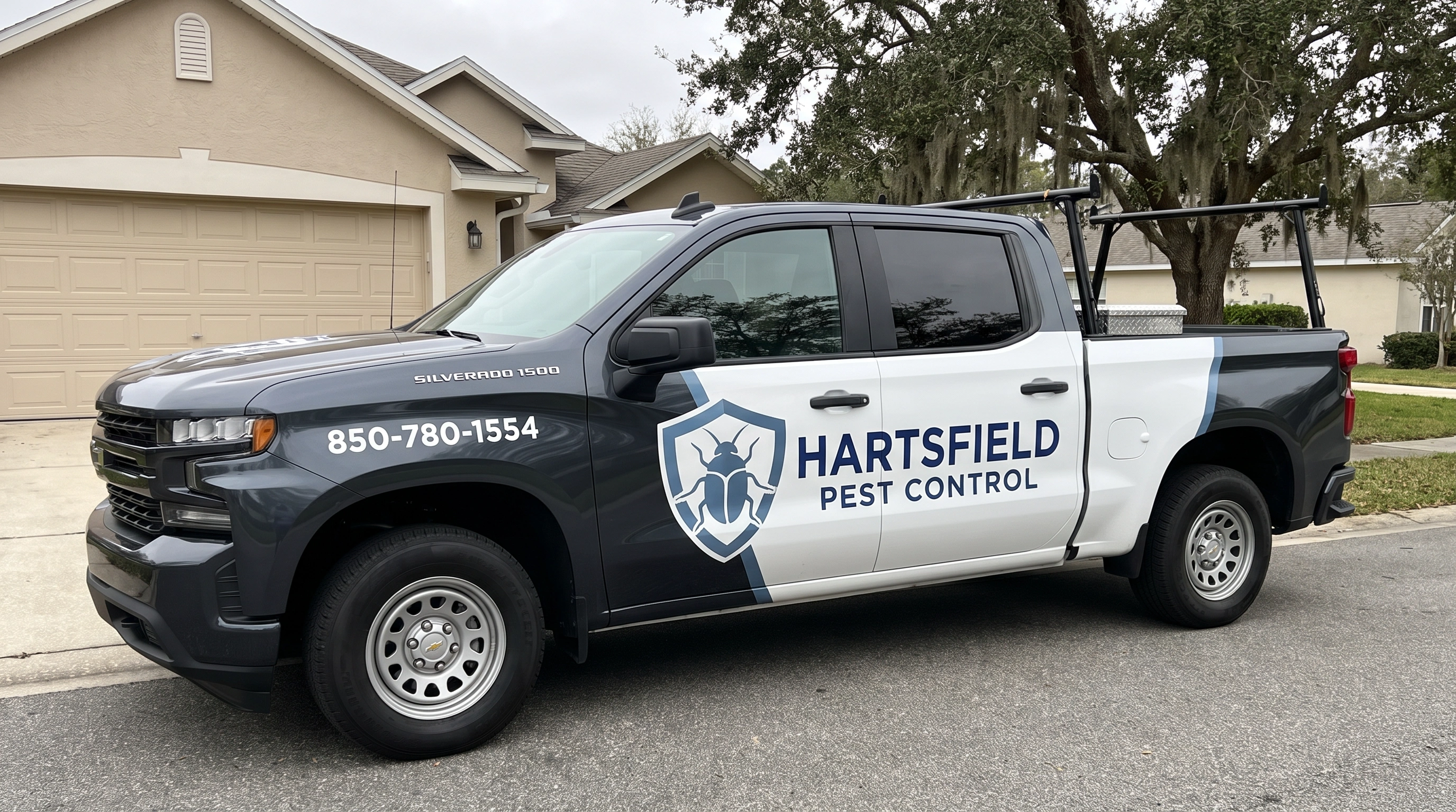 Pest control technician inspecting a Tallahassee home